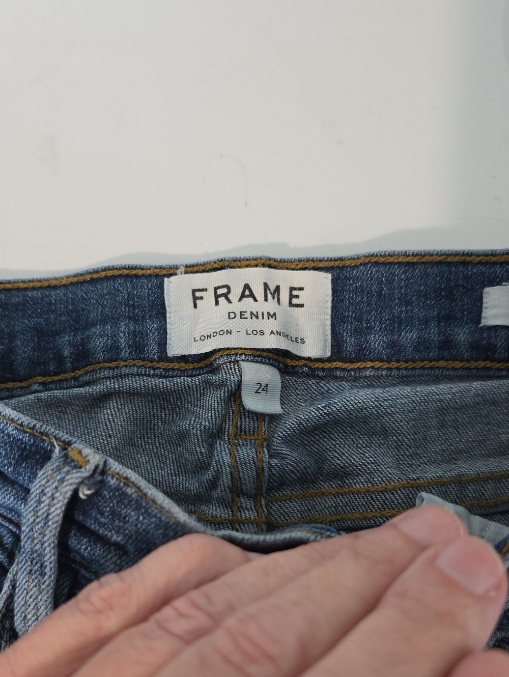 FRAME Denim Slim Jeans in Medium Blue Wash
